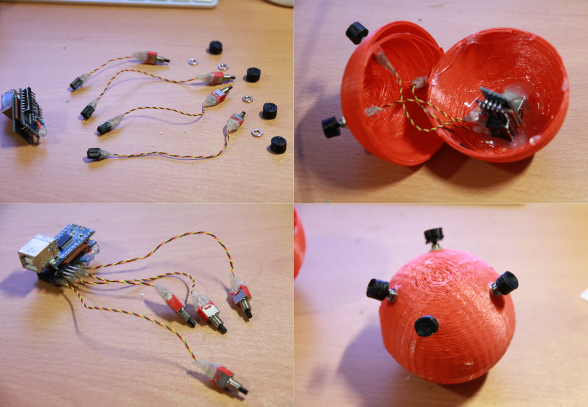Wired sensors and the electronics inside an opened orange 3D-printed shell